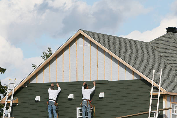 Professional Siding Contractor technician working in Rising Sun, IN